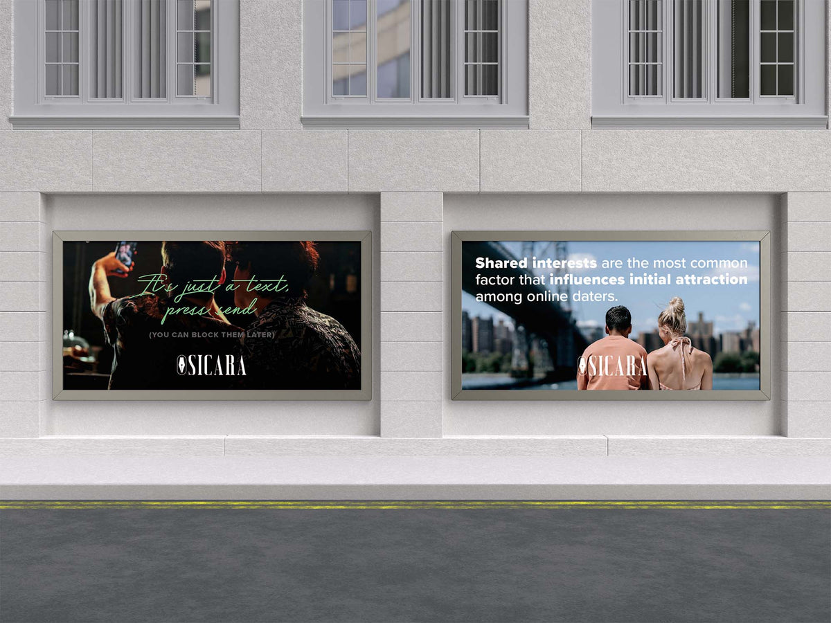 Two framed digital advertisements mounted side-by-side on a light gray stone wall above a dark asphalt ground. The left ad is dark with text reading 'It's just a text, you read' and the brand name '#SICARA'.